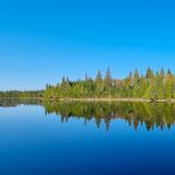 Am nächsten Morgen ist es windstill und so lockt der "Lake Wasp" für Spiegelbilder. 
